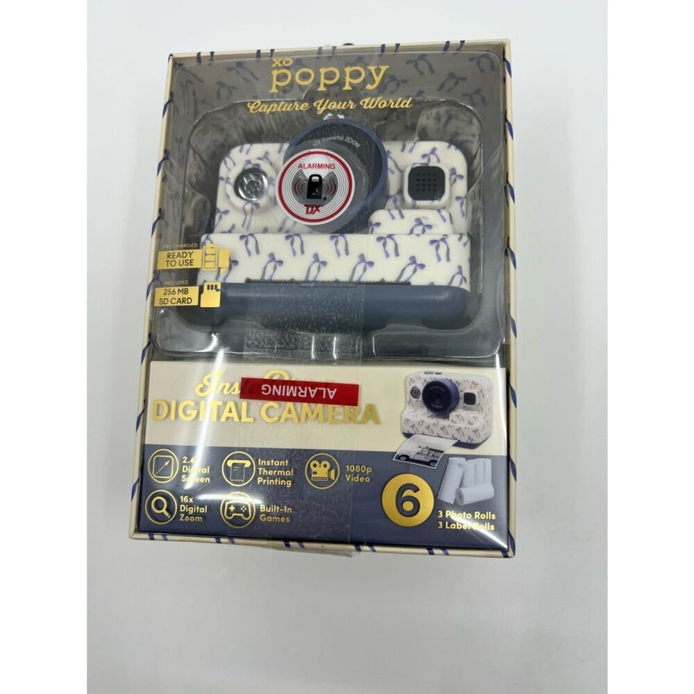 NIB XO Poppy White Digital insta-print Camera with Blue ribbon Accents
